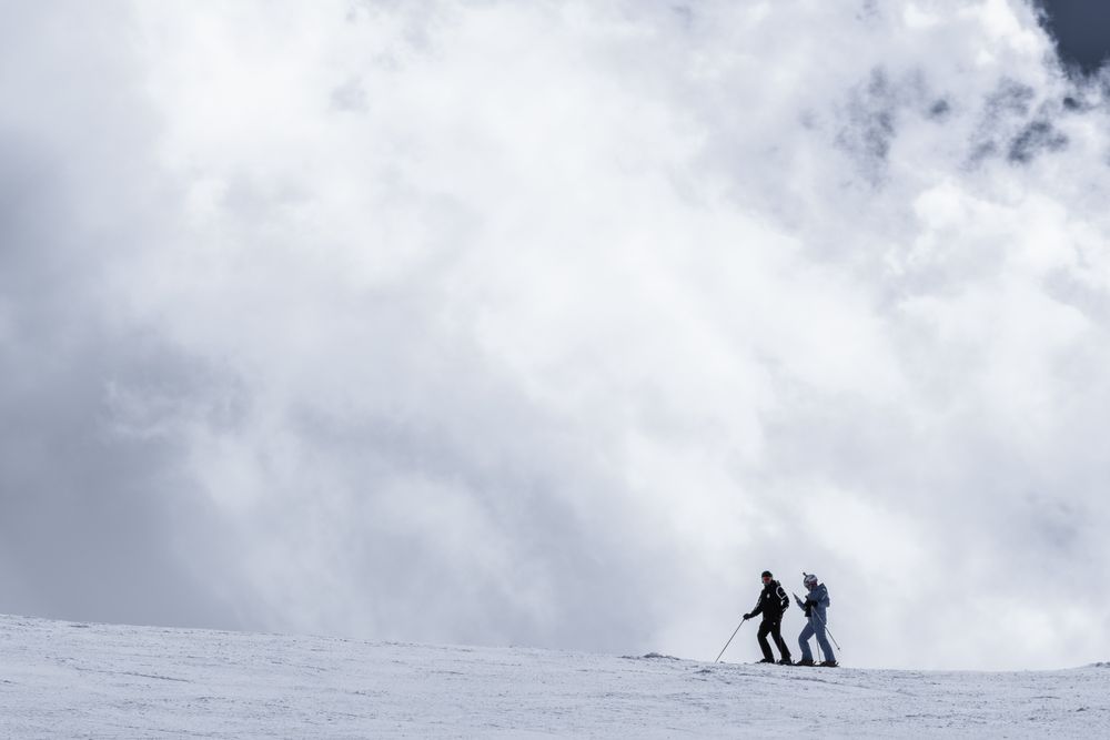 Men skiing on winter day