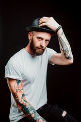 Smiling young guy in hat