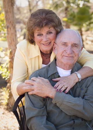 Mature Woman with Man Wearing Oxygen Tubes