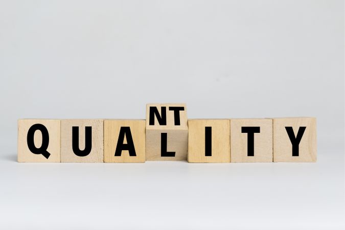 flip wooden blocks with quality and quantity words