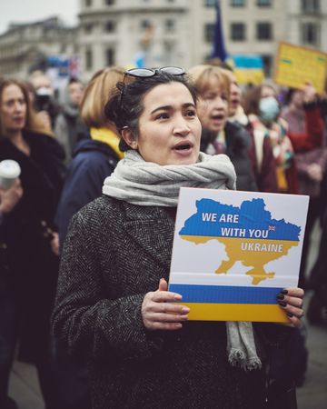 London, England, United Kingdom - March 5 2022: Woman with “We are with you Ukraine” sign