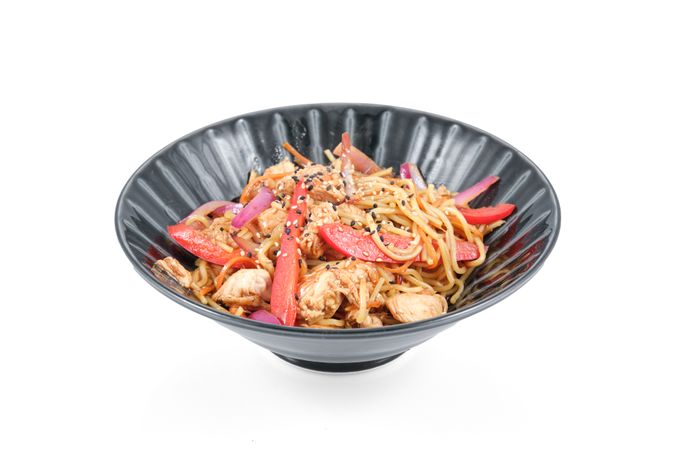 Bowl of wok noodles with chicken