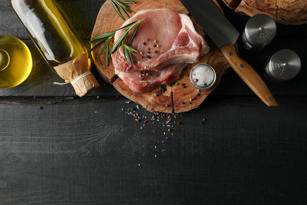 Composition with raw meat and ingredients. Cooking steak concept