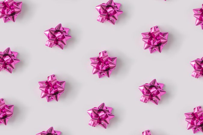 Pattern of plastic pink decorative gift bows