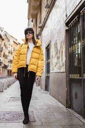 Trendy woman walking on street