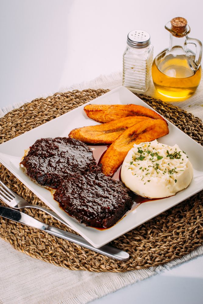 Traditional Venezuelan dish, Beef, Mashed potatoes and Fried plantains