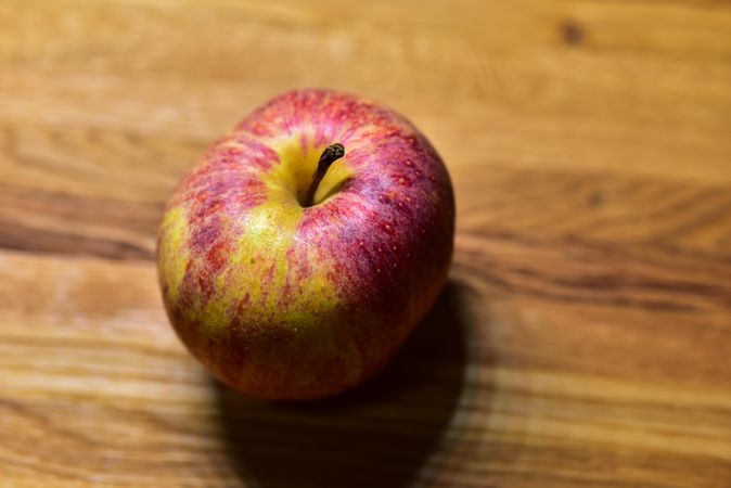 Apple on a wooden table