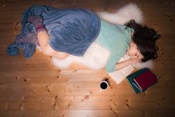 Beautiful female fell asleep while reading
