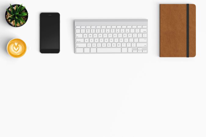 Modern workspace with coffee cup, smartphone, paper, notebook and tablet copy space