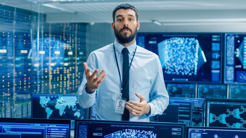 In the World's Top Machine Learning Facility Scientist Excitedly Describes Project He Works on.