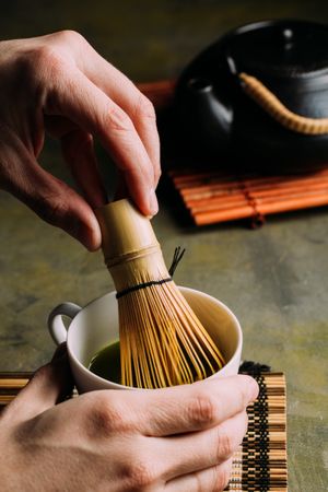 Preparing matcha tea