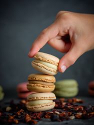 Anonymous kid with sweet macaroons