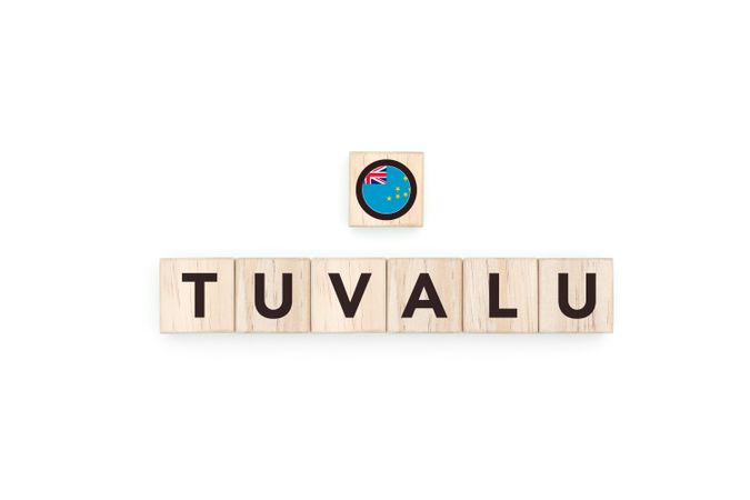 Wooden blocks bearing the name and flag of Tuvalu.