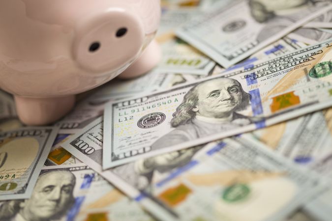 Piggy Bank on Newly Designed One Hundred Dollar Bills