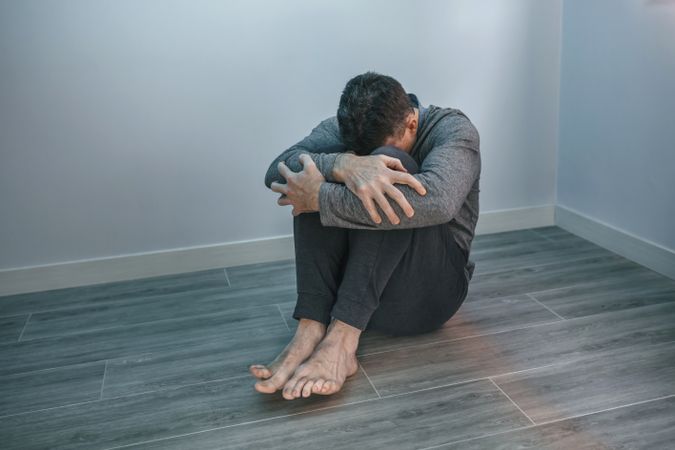Unrecognizable desperate man with problems