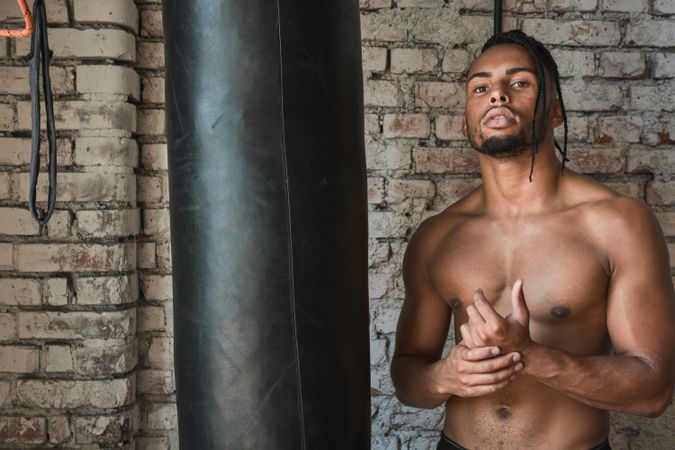 Confident Black boxer in gym