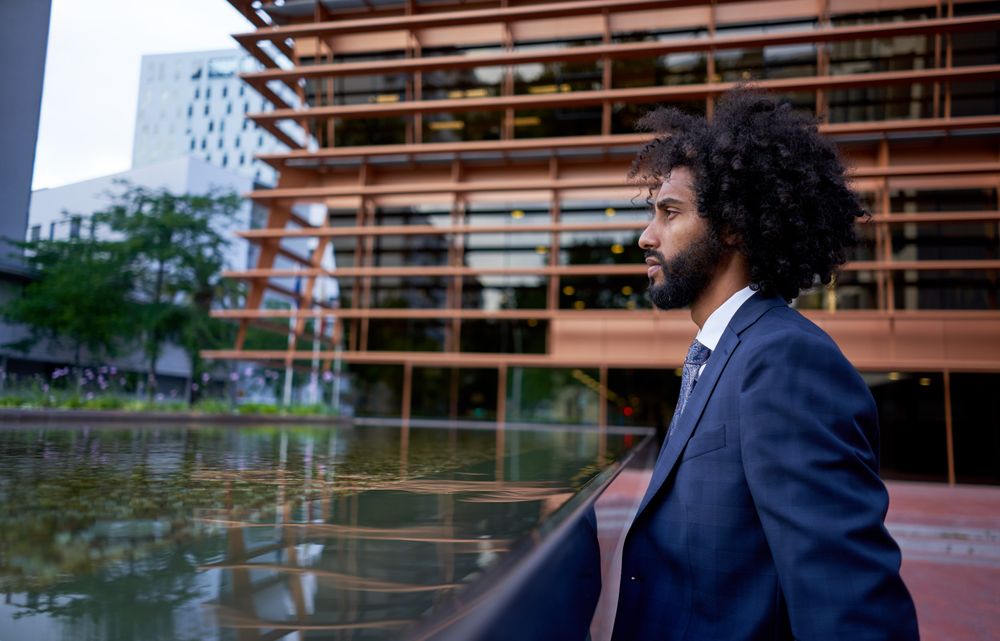 Confident businessman looking away