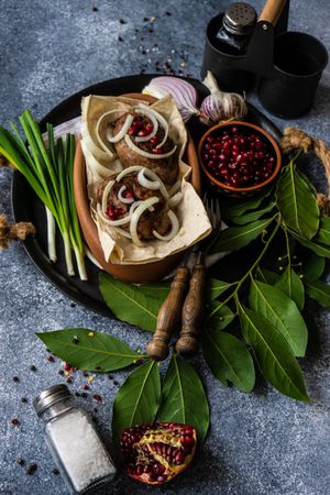 Plate of Georgian Abkhazura with pomegranate seeds and onions