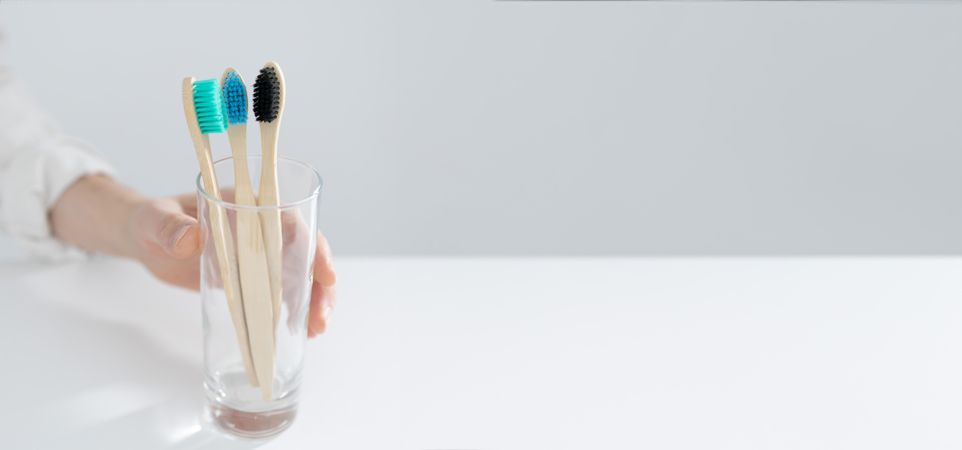Eco-friendly bamboo toothbrush in glass