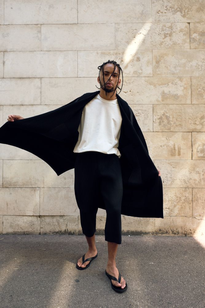 Trendy Black man posing on street