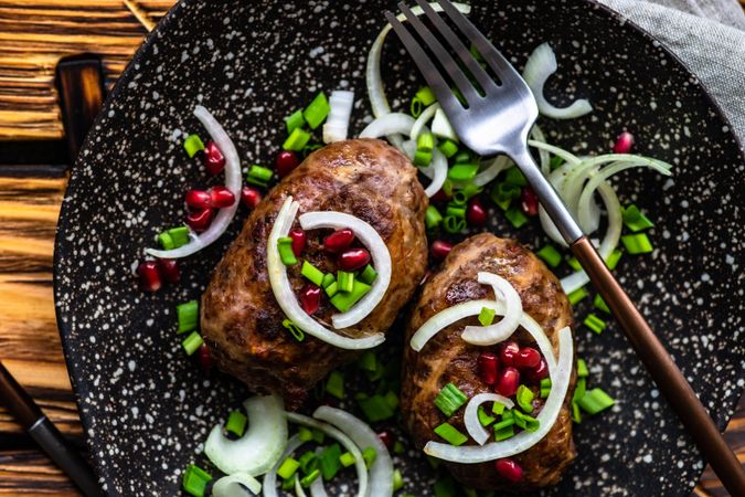 Plate of two abkhazura cutlets on plate