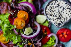 Close up of organic vegetable salad and sesame seeds