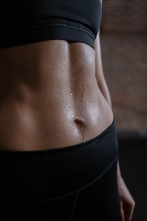 Close-up shot of woman's trained abs