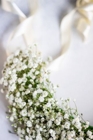 Close up of headdress detail of gypsophila paniculata flowers on marble table