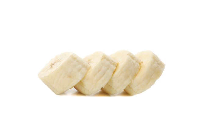 Banana slices isolated on blank background. Fresh fruit