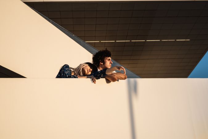 Angry couple on modern building