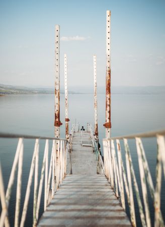Rusty pier near calm sea