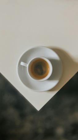 Overhead Espresso Coffee Cup on Corner Table