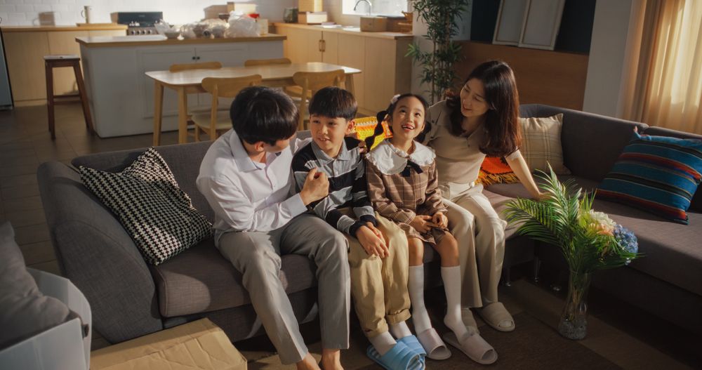 Portrait of a Happy Korean Family Arriving at Their Newly Purchased Home