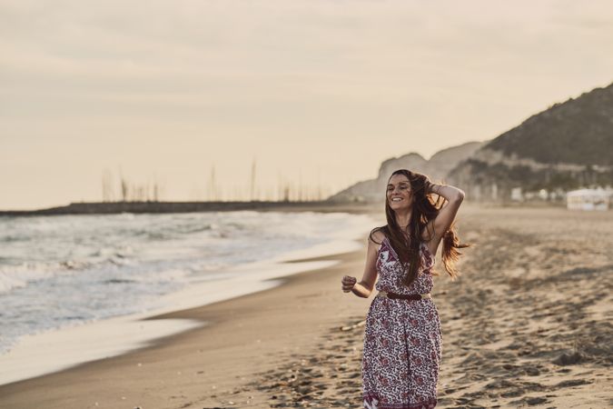 Woman with dress at the beach