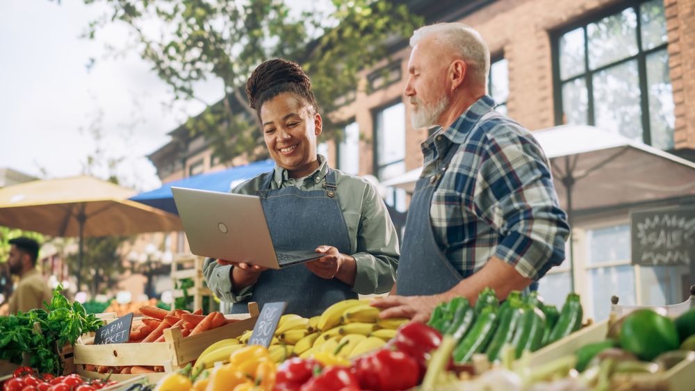 Partners Working at a Farmers Market.