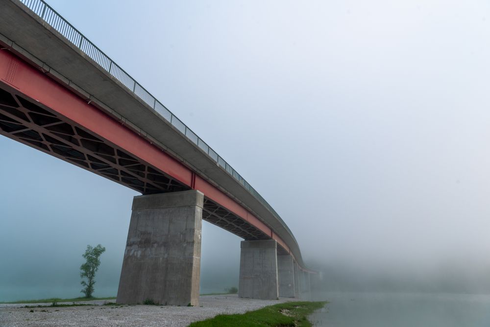 Bridge Sylvenstein on a foggy morning, side view from under the bridge