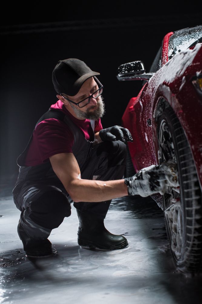 Portrait of an Adult Man Working in a Detailing Studio