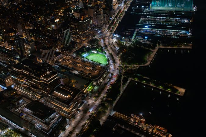 Aerial View of New York City. Helicopter Image of a Highway and Port Area in New York City. Panoramic View with Traffic Around a Big City with Skyscrapers in the Background