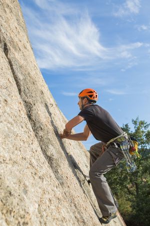 Man climbing a rock