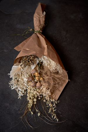 Bouquet of dried flowers on black background