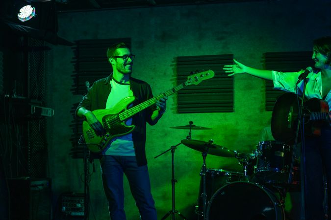 Young Musician Playing The Bass In A Live Concert