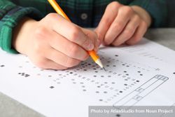 Close up of student taking a multiple-choice exam 43dPxb