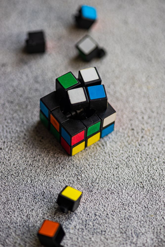 Rubik's cube details on the concrete background
