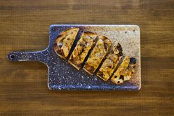 Top view of pate on a piece of toast served in restaurant