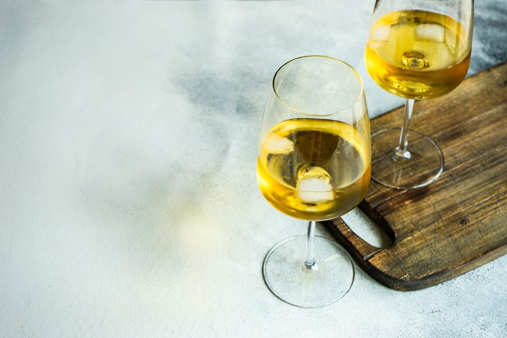 Glass of wine on rustic background