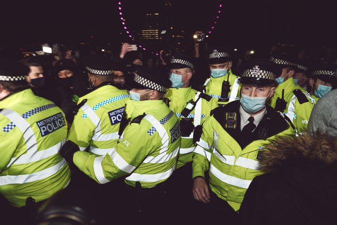 London, England, United Kingdom - March 16, 2021: Metropolitan Police officers at protest