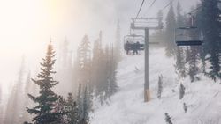 People on chairlift upping on snow mountain