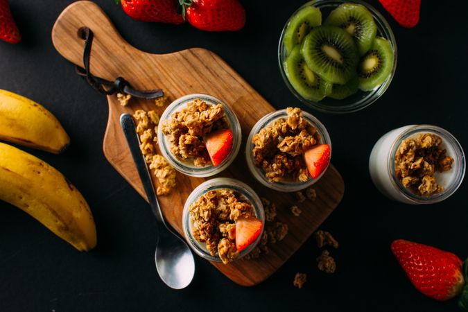 Flat lay of fruits and walnuts in milk