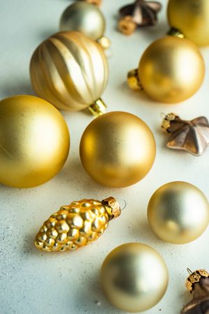 Golden Christmas decorations on marble table
