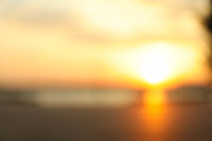 Blurred photo of amazing sunset. Amazing summer sunset
